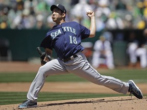 Seattle Mariners pitcher Yusei Kikuchi works against the Oakland Athletics in the first inning of a baseball game Saturday, May 25, 2019, in Oakland, Calif.