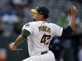 Oakland Athletics pitcher Frankie Montas works against the Los Angeles Angels in the first inning of a baseball game Tuesday, May 28, 2019, in Oakland, Calif.