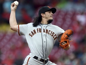San Francisco Giants' Dereck Rodriguez throws during the first inning of the team's baseball game against the Cincinnati Reds, Saturday, May 4, 2019, in Cincinnati.