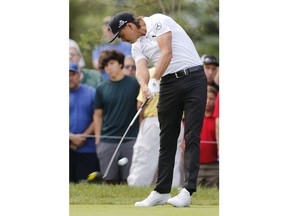 Rickie Fowler tees off on the 11th hole during the second round of the Memorial golf tournament Friday, May 31, 2019, in Dublin, Ohio.