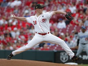 Cincinnati Reds starting pitcher Anthony DeSclafani throws in the first inning of a baseball game against the Los Angeles Dodgers, Friday, May 17, 2019, in Cincinnati.