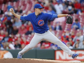 Chicago Cubs starting pitcher Kyle Hendricks throws during the first inning of the team's baseball game against the Cincinnati Reds, Tuesday, May 14, 2019, in Cincinnati.