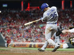 Los Angeles Dodgers' Cody Bellinger hits a solo home run off Cincinnati Reds relief pitcher Zach Duke in the eighth inning of a baseball game, Friday, May 17, 2019, in Cincinnati.