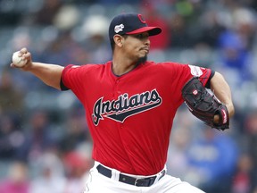 Cleveland Indians starting pitcher Carlos Carrasco delivers against the Seattle Mariners during the first inning of a baseball game, Saturday, May 4, 2019, in Cleveland.