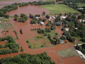 Flooding in Kingfisher, Okla. is pictured from the air, Tuesday, May 21, 2019. Flooding following heavy rains was an issue across the state.