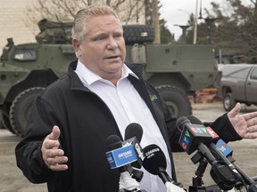 Ontario Premier Doug Ford speaks to media after meeting military helping with flood relief efforts in Bracebridge, Ont., on Friday, May 3, 2019.