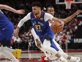 Denver Nuggets guard Jamal Murray drives to the basket during the first half of Game 6 of the team's NBA basketball second-round playoff series against the Portland Trail Blazers on Thursday, May 9, 2019, in Portland, Ore.