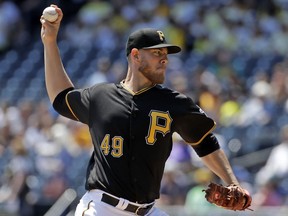 Pittsburgh Pirates starting pitcher Nick Kingham delivers during the first inning of a baseball game against the Texas Rangers in Pittsburgh, Wednesday, May 8, 2019.