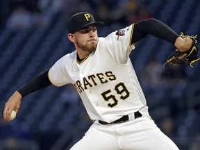 Pittsburgh Pirates starting pitcher Joe Musgrove delivers in the first inning of a baseball game against the Oakland Athletics in Pittsburgh, Friday, May 3, 2019.