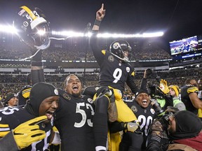 FILE - In this Nov. 26, 2017, file photo, Pittsburgh Steelers kicker Chris Boswell (9) is carried off the field after kicking the game-winning field goal against the Green Bay Packers in Pittsburgh. The Steelers kicker knows his underwhelming 2018 season directly contributed to the Steelers missing the playoffs. Yet rather than reinvent his offseason routine, he doubled down confident, he could bounce back.