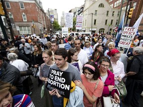 Anti-abortion protesters rally near a Planned Parenthood clinic in Philadelphia, Friday, May 10, 2019. The demonstration was spurred by the actions of a Democratic state lawmaker who recorded himself berating an anti-abortion demonstrator at length outside the clinic.