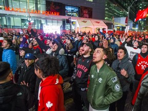 Fans in Jurassic Park at Maple Leaf Square in Toronto, Ont. watch on the big screen as the Toronto Raptors play against the Washington Wizards on Friday April 20, 2018.