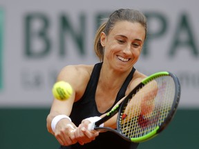 Croatia's Petra Martic plays a shot against Karolina Pliskova of the Czech Republic during their third round match of the French Open tennis tournament at the Roland Garros stadium in Paris, Friday, May 31, 2019.