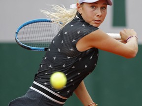 Amanda Anisimova of the U.S. plays a shot against Aryna Sabalenka of Belarus during their second round match of the French Open tennis tournament at the Roland Garros stadium in Paris, Thursday, May 30, 2019.
