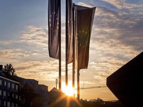 European flags blow in front of the European Central Bank as the sun rises in Frankfurt, Germany, Sunday, May 26, 2019.