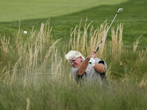 290John Daly hits out of a bunker on the 18th hole during the second round of the PGA Championship golf tournament, Friday, May 17, 2019, at Bethpage Black in Farmingdale, N.Y.