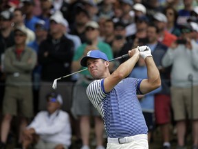 Paul Casey of England hits off the 17th tee during the final round of the PGA Championship golf tournament, Sunday, May 19, 2019, at Bethpage Black in Farmingdale, N.Y.