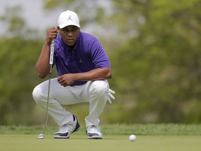 Harold Varner III lines up a putt on the third hole during the final round of the PGA Championship golf tournament, Sunday, May 19, 2019, at Bethpage Black in Farmingdale, N.Y.