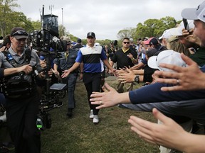 Brooks Koepka walks to the 10th tee during the final round of the PGA Championship golf tournament, Sunday, May 19, 2019, at Bethpage Black in Farmingdale, N.Y.