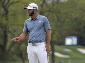 Dustin Johnson reacts after a putt on the 17th green during the final round of the PGA Championship golf tournament, Sunday, May 19, 2019, at Bethpage Black in Farmingdale, N.Y.
