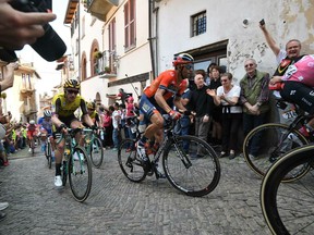 Italy's Vincenzo Nibali, center, pedals during the 12th stage of the Giro d'Italia, tour of Italy cycling race, from Cuneo to Pinerolo, Thursday, May 23, 2019.