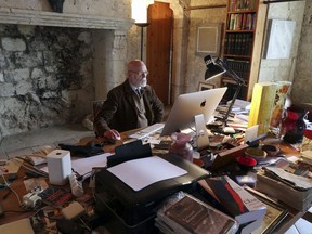 In this April 4, 2019, photo, a candidate for Europe's legislature Renaud Camus, who coined the term, "the great replacement," sits in his house during an interview with The Associated Press in Plieux, southwestern France. A study obtained by the AP shows a drastic rise in recent years of the phrase "the great replacement," the concept that European populations are being supplanted by mainly Muslim immigrants as part of a global plot.