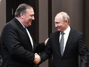 U.S. Secretary of State Mike Pompeo, left, meets with Russian President Vladimir Putin in Sochi on May 14, 2019.