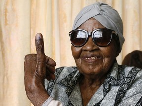 108-year-old MMaphuti Mabitsela shows her marked thumb nail after casting her special vote, at her home in Atteridgeville, near Pretoria, South Africa on Monday May 6, 2019. Mabitsela took part in South Africa's special voting for the elderly and infirm where electoral officials go to their homes or care facilities before the actual voting day of May 8.