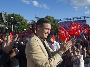 Spain's caretaker Prime Minister Pedro Sanchez applauds party supporters during the campaign for the European and municipal elections in Madrid, Spain, Friday, May 24, 2019. European Elections take place in each EU nation between May 23-26 and in Spain on May 26.