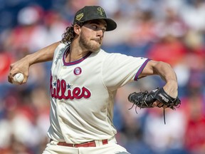 Philadelphia Phillies starting pitcher Aaron Nola throws during the first inning of a baseball game against the Colorado Rockies, Saturday, May 18, 2019, in Philadelphia.