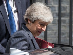 Prime Minister Theresa May, departs Downing Street for PMQs.