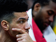 Toronto Raptors' Danny Green and Kawhi Leonard watch from the bench during the second half of Game 2 of the NBA Eastern Conference finals against the Milwaukee Bucks, May 17, 2019.