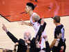 Fans cheer after Toronto Raptors guard Danny Green makes a three point shot against the Golden State Warriors.