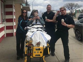 April Boldt with her father Donn Hale and SPTS attendants Brad Tice (left) and Eric Taylor at the Milky Way ice cream shop in Regina.