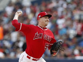 Los Angeles Angels' Trevor Cahill pitches during the first inning of a baseball game against the Houston Astros, in Monterrey, Mexico, Saturday, May 4, 2019.