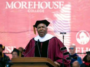 Billionaire technology investor and philanthropist Robert F. Smith announces he will provide grants to wipe out the student debt of the entire 2019 graduating class at Morehouse College in Atlanta, Sunday, May 19, 2019.