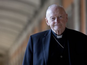 FILE - In this Feb. 13, 2013 file photo, Cardinal Theodore Edgar McCarrick poses during an interview with the Associated Press, in Rome. Email correspondence shows disgraced ex-Cardinal Theodore McCarrick was placed under Vatican travel restrictions in 2008 for sleeping with seminarians, but regularly flouted those rules with the apparent knowledge of Vatican officials under Pope Benedict XVI and Pope Francis. Francis defrocked McCarrick in February after a church investigation confirmed that McCarrick sexually abused minors and adults.