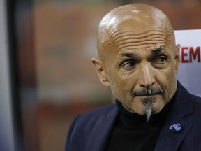 FILE - In this May 13, 2019 file photo, Inter Milan coach Luciano Spalletti sits on the bench during a Serie A soccer match between Inter Milan and Chievo, at the San Siro stadium in Milan, Italy. Inter Milan said Thursday, May 30, 2019 that Spalletti has left the club, with Antonio Conte expected to replace him in the next few days.