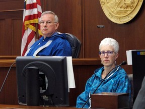 Alaska House Speaker Bryce Edgmon listens to discussion on the House floor on Friday, May 3, 2019, in Juneau, Alaska, with House Chief Clerk Crys Jones on the right. The House rejected a Senate rewrite of the state budget Friday, clearing the way for negotiators to work toward a compromise.