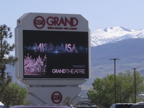 The marquee promotes the Miss USA pageant an hour before it began Thursday, May 2, 2019 at the Grand Sierra hotel-casino in Reno, Nevada. It's the first time the northern Nevada city on the edge of the Sierra has hosted the event that dates to 1952. This year's contestants included a psychological operations expert in the Army reserves, an ex-NFL cheerleader working to become a surgical nurse and a lawyer who represents some prisoners for free.