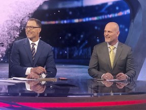 Former New Jersey Devils defensemen Scott Stevens, left, and Ken Daneyko appear on the set of NHL Network in Secaucus, N.J., Monday, April 29, 2019. After teaming up to help the New Jersey Devils win the Stanley Cup three times, retired defensemen Scott Stevens and Ken Daneyko are back together on the other side of the camera doing TV at NHL Network. After developing on-ice chemistry over 12 years, doing it on the air is a new challenge.