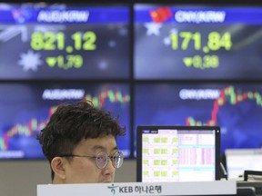 A currency trader watches monitors at the foreign exchange dealing room of the KEB Hana Bank headquarters in Seoul, South Korea, Monday, May 27, 2019. Shares were mixed early Monday in Asia in the absence of fresh news on the tariffs standoff between the U.S. and China.