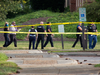 Police work the scene where 12 people were killed during a mass shooting at the Virginia Beach city public works building, May 31, 2019 in Virginia Beach, Va.