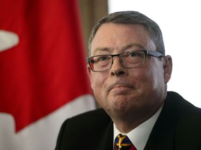 Vice Admiral Mark Norman reacts during a press conference in Ottawa on Wednesday, May 8, 2019. The charges against Norman were dropped.