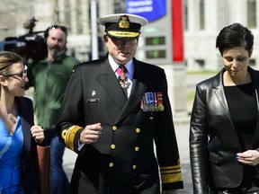 Vice-Admiral Mark Norman walks with his lawyers Marie Henein and Christine Mainville as they leave court in Ottawa on Wednesday, May 8, 2019.