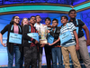 The eight co-champions of the 2019 Scripps National Spelling Bee, from left, Shruthika Padhy, 13, of Cherry Hill, N.J., Erin Howard, 14, of Huntsville, Ala., Rishik Gandhasri, 13, of San Jose, Calif., Christopher Serrao, 13, of Whitehouse Station, N.J., Saketh Sundar, 13, of Clarksville, Md., Sohum Sukhatankar, 13, of Dallas, Texas, Abhijay Kodali, 12, of Flower Mound, Texas, and Rohan Raja, 13, of Irving, Texas, hold the trophy in Oxon Hill, Md., May 31, 2019.