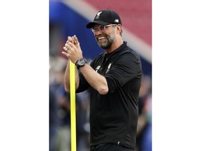 Liverpool coach Juergen Klopp smiles during a training session at the Wanda Metropolitano stadium in Madrid, Friday May 31, 2019. English Premier League teams Liverpool and Tottenham Hotspur are preparing for the Champions League final which takes place in Madrid on Saturday night.