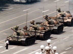 No one knows who the man was in this iconic photograph taken on  June 5, 1989, the day after the Tiananmen Square massacre in Beijing, in which thousands of peaceful protesters were killed by Chinese troops. It's quite likely he doesn't even know he's famous, if he's still alive, writes Terry Glavin.