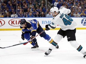 St. Louis Blues defenseman Colton Parayko (55) tries to block the shot of San Jose Sharks center Tomas Hertl (48), of the Czech Republic, during the second period in Game 4 of the NHL hockey Stanley Cup Western Conference final series Friday, May 17, 2019, in St. Louis.