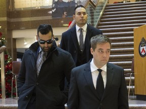 Toronto Police Service officers (left to right) Sameer Kara, Joshua Cabero and Leslie Nyznik leave a disciplinary hearing on Thursday December 13, 2018.